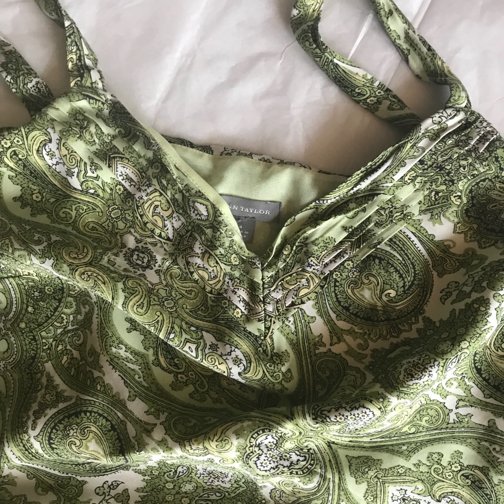 100% silk sleeveless blouse.